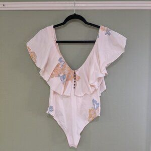 FP Intimatly! V-neck bodysuit in a floral cream in Medium.